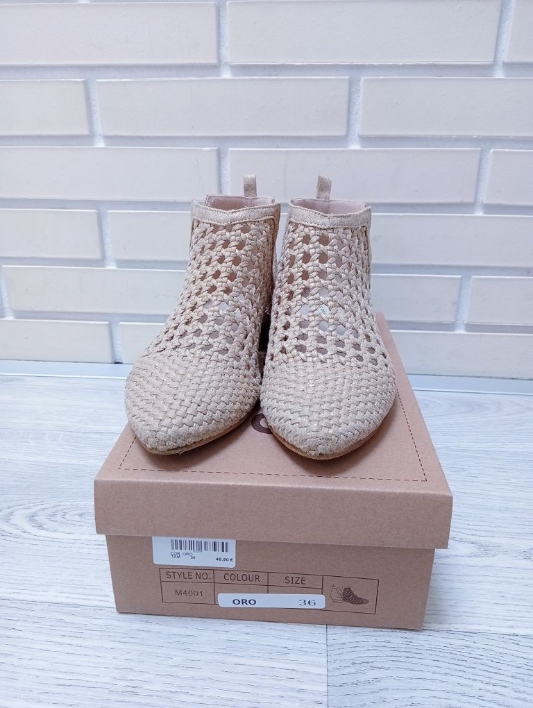 Botins Corina Dourados