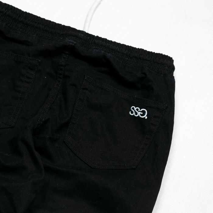 SSG spodnie joggery L męskie logowane