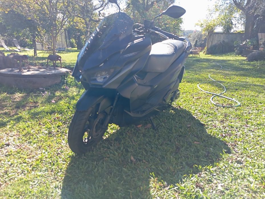 Sym jet x 125. Aquecimento a punhos