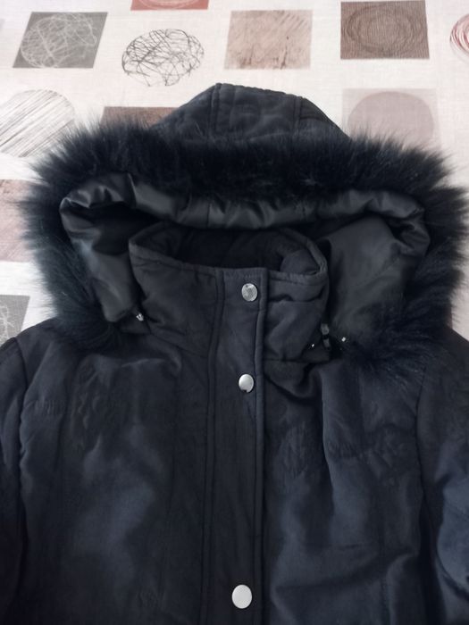 Casacos e botas de senhora em segunda mão