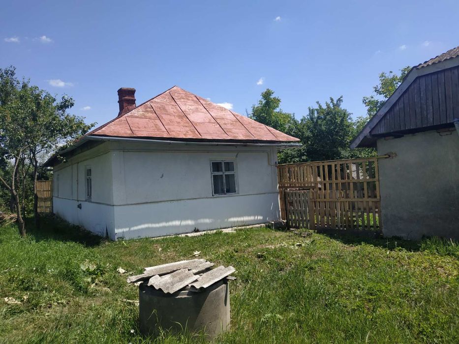 Ділянка з будинком