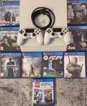 PS4 PRO + 2 pady i zestaw gier