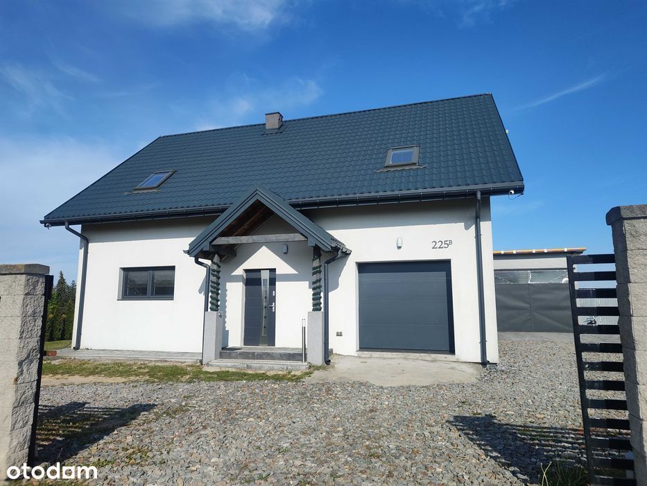 Nowoczesny dom z garażem w spokojnej okolicy
