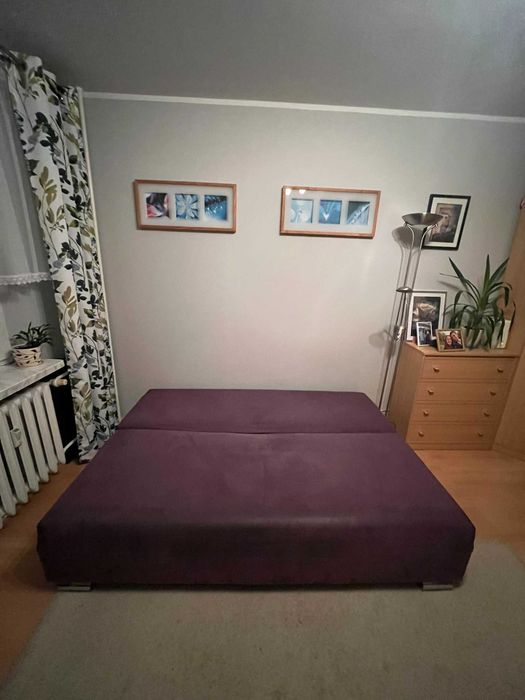 Kanapa rozkładana 135x190 cm fioletowa