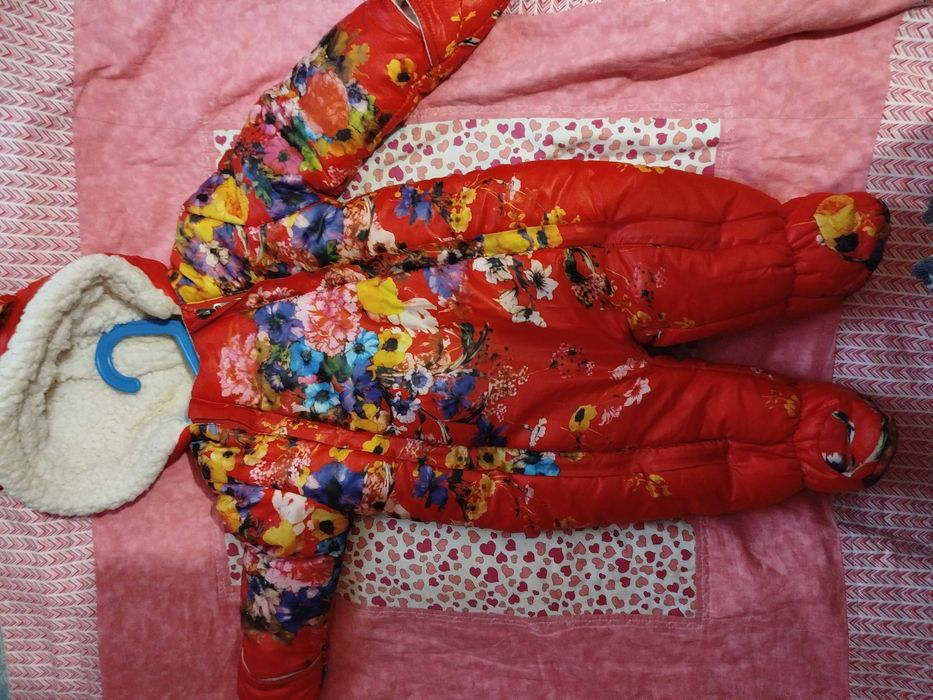 Зимові комбінезони