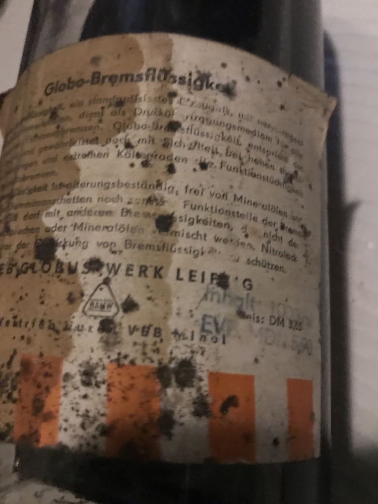 DDR Stara szklana butelka po płynie ham., czasy PRL, produkcja DDR NRD
