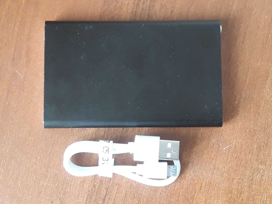 Зовнішній аккумулятор Power bank 12000 mAh + універсальний USB кабель.