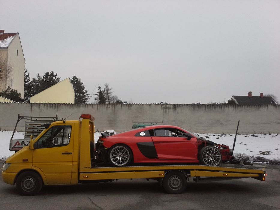 Pomoc drogowa autolaweta transport aut Europa - Polska holowanie