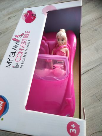 Nowa lalka a'la Barbie w różowym cabriolecie. Lalka w samochodzie.