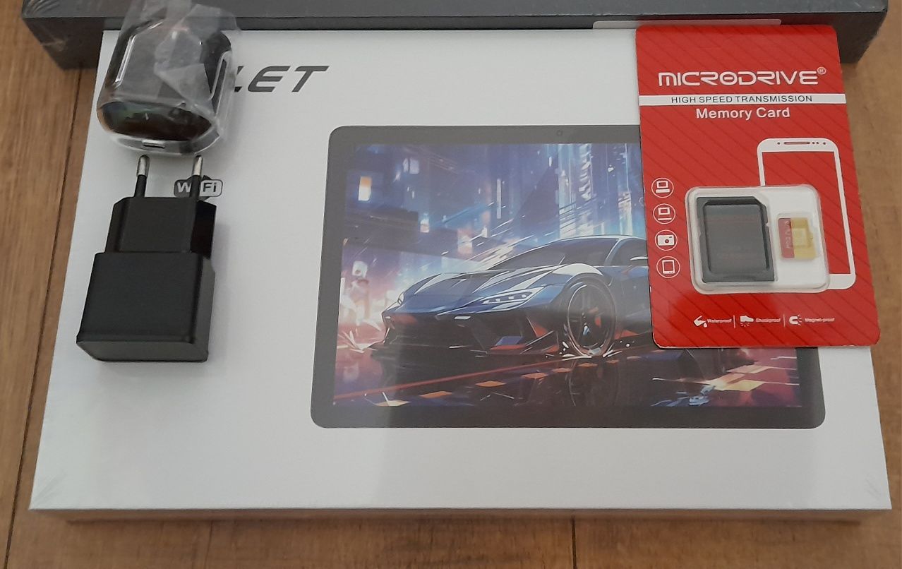 Tablet 4/32 GB z kartą SD 64GB, ładowarką i słuchawkami bluetooth