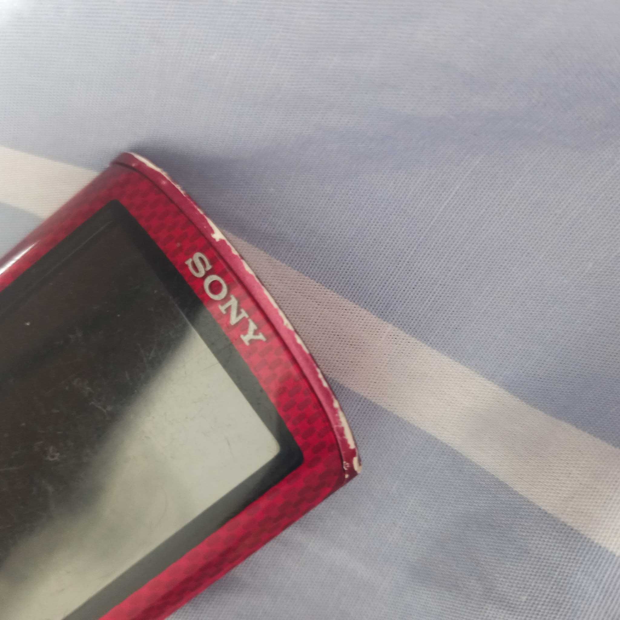 Mp4  Sony  ( com marcas de uso ) carregador e a funcionar.