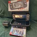 Nintendo switch lite + grą + dodatki