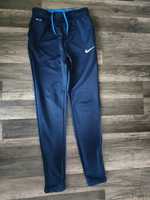 sportowe, dresowe spodnie Nike dri-fit z zamkami 147/158