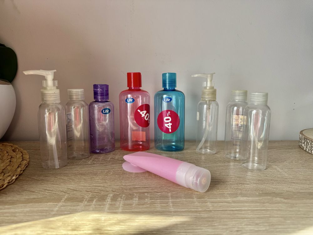 9 pojemniczków na kosmetyki / pojemniki podróżne / butelki 100 ml i in