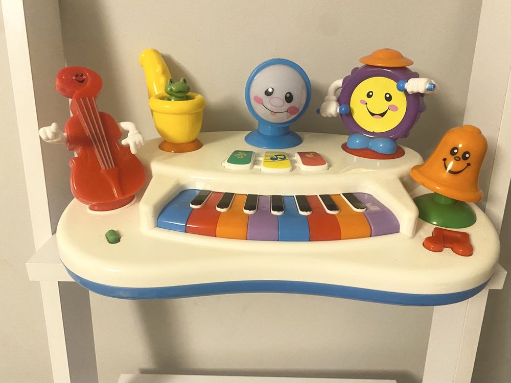 Zabawka interaktywna fortepian, organy, orkiestra gra i świeci