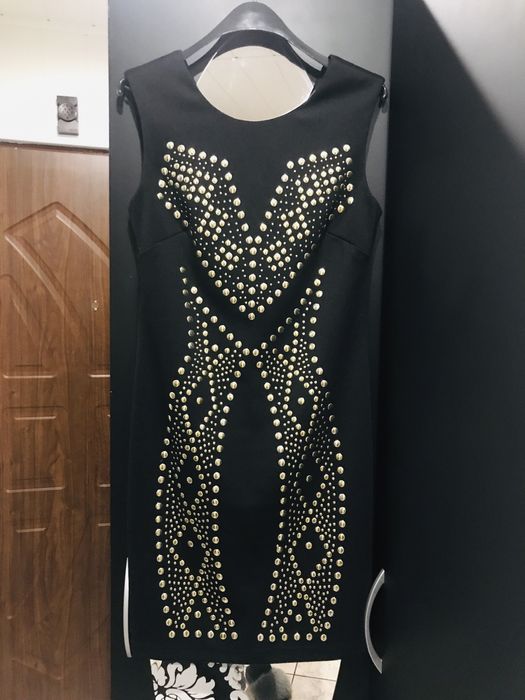 Sukienka z dżetami reserved