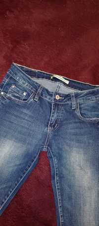 Spodnie jeans 38/M