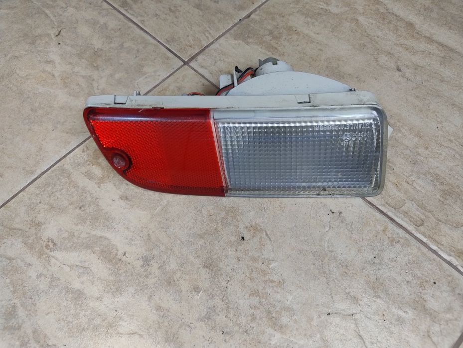 Lampa tył w zderzak cofania prawa Subaru justy Suzuki Ignis 03-08 euro