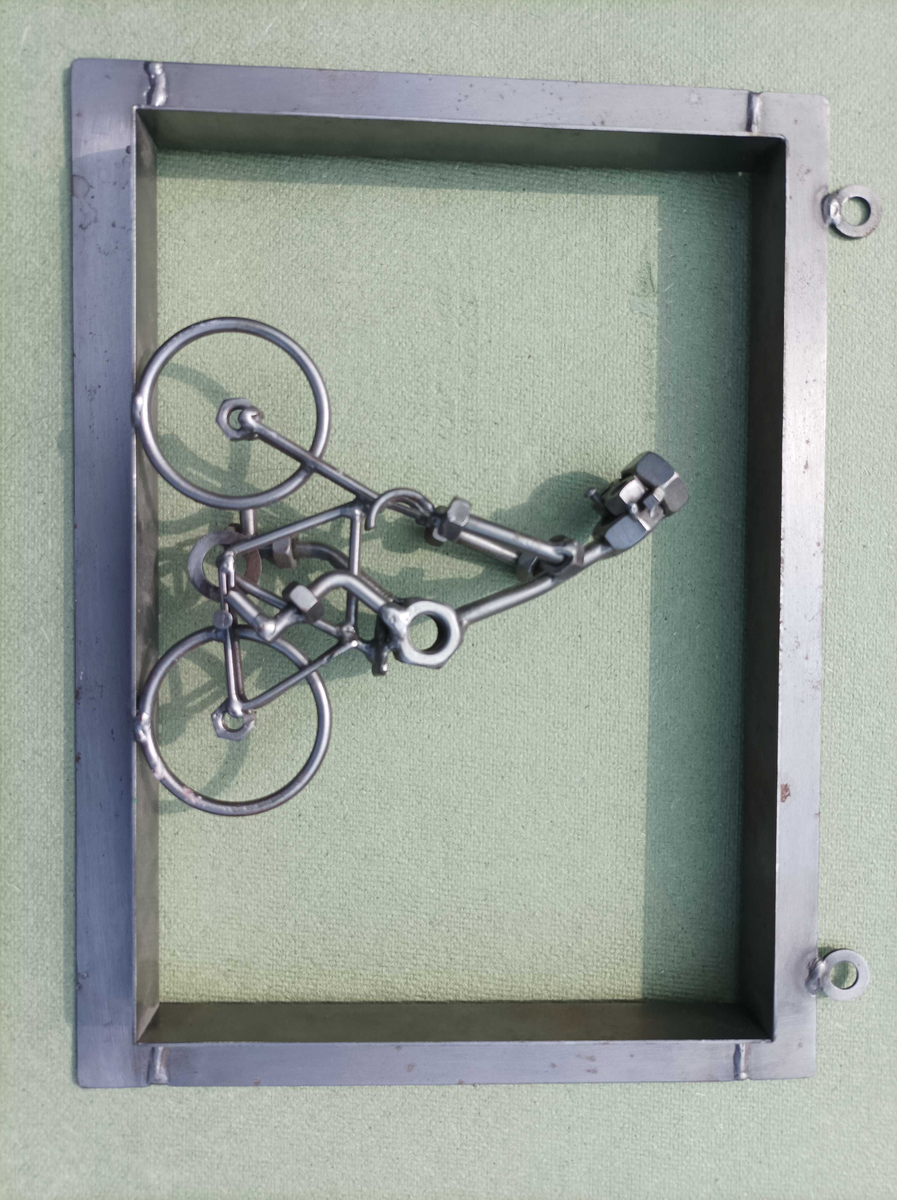 Metalowy obraz rower rowerzysta