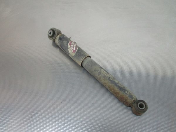 Amortecedor trás esquerdo OPEL Astra H Hatchback (L48)