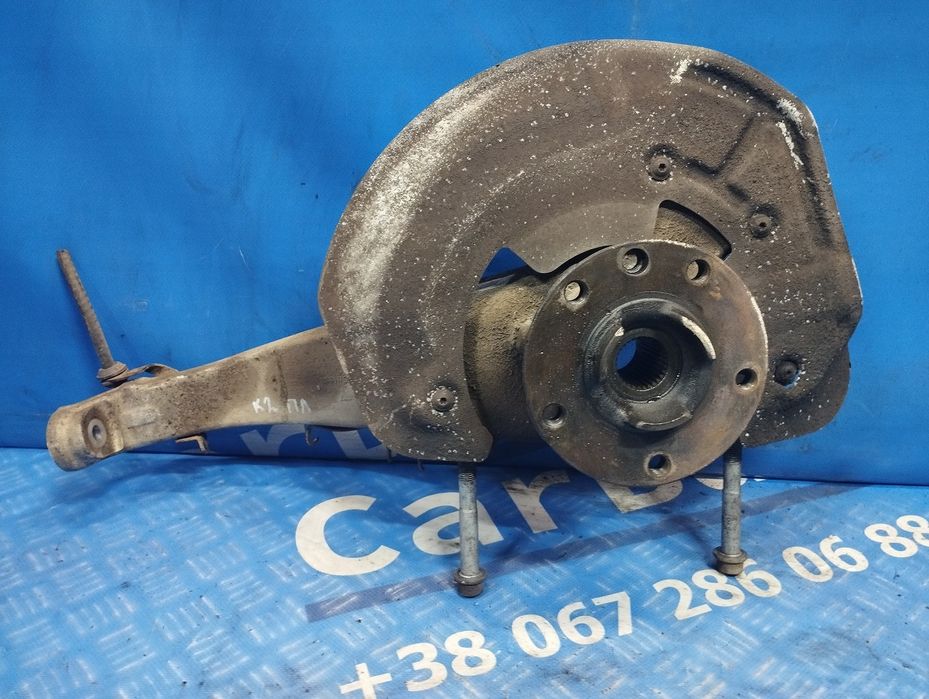 Ступиця (кулак цапфа) передня ліва Porsche Cayenne 958 Порш Каєн