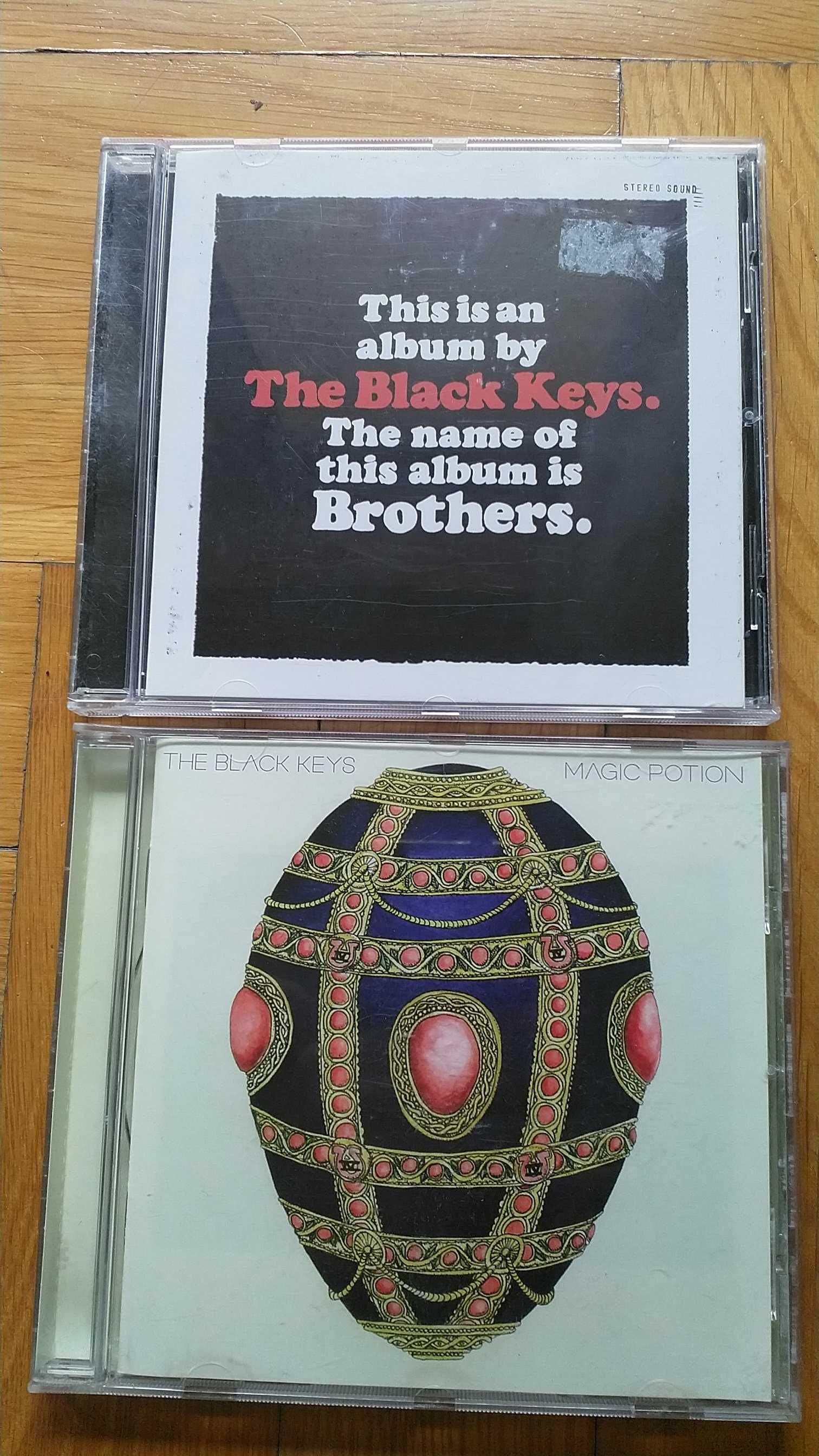 płyty cd - The black keys - Magic potion i brothers