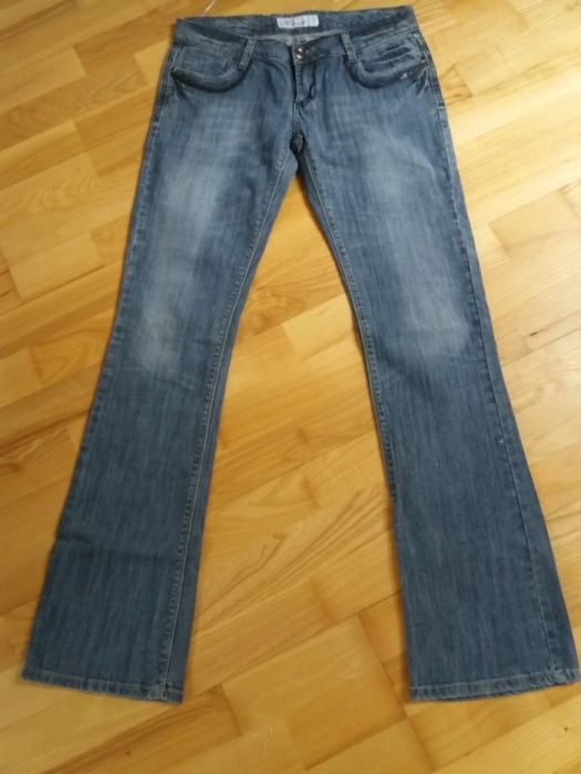 szare jeansy biodrowki dzwony L 40 na wysoka