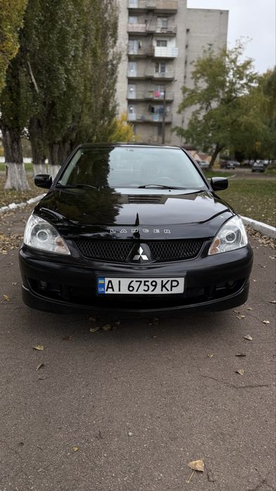 Mitsubishi Lancer 9 1.6 газ/бензин автомат AT