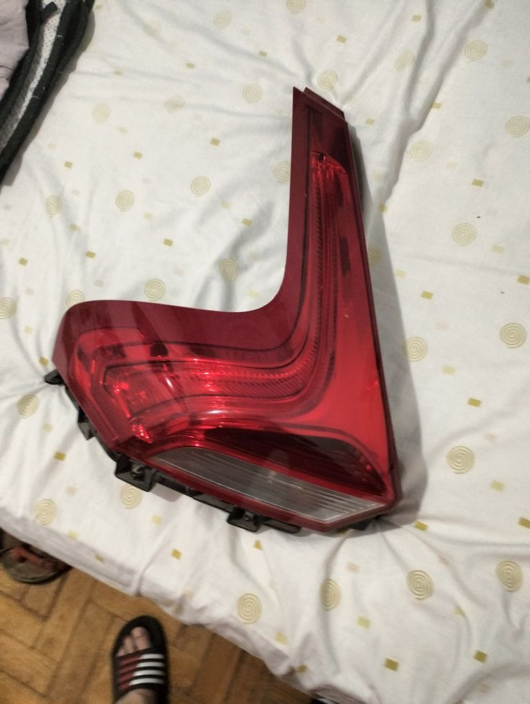 Vendo farol esquerdo ,Volvo V 40