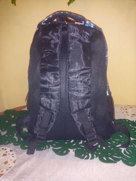 Nowy. Plecak pakowny z motywami odblaskowymi .