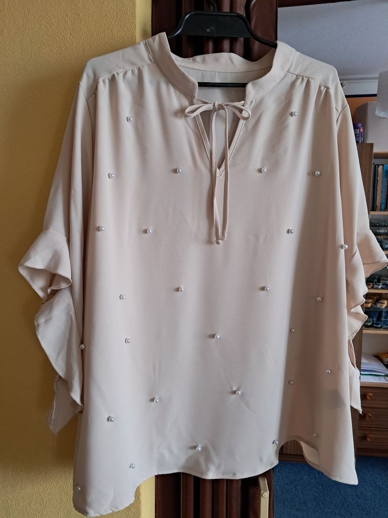 Nową bluzka beżowa rozmiar 4 xl