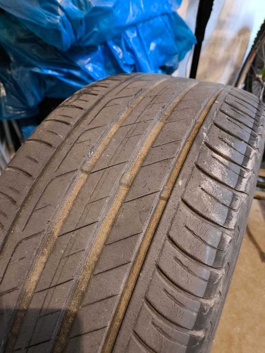 Koła stalowe Continental + letnie Turanza + kołpaki Opel