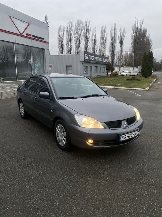 Mitsubishi Lancer 9 1.6 газ4 автомат