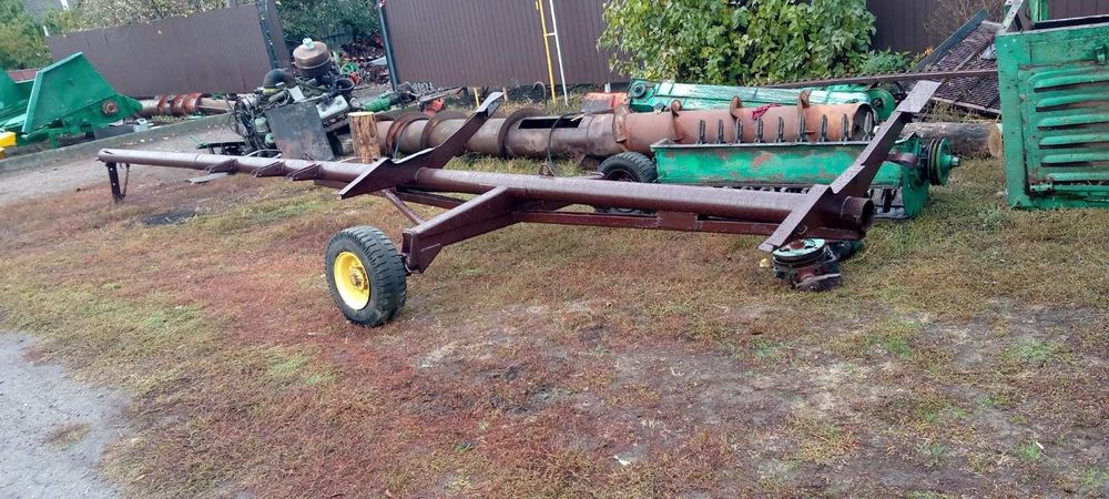 Телега для перевозки зерновой жатки