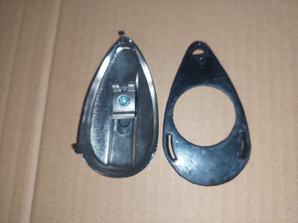 Nowy kpl oslona stacyjki,zasuwka+uszczelka guma lampy wsk125 m06-b1 pl