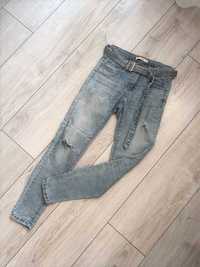 Spodnie jeansowe skinny z dziurami 36