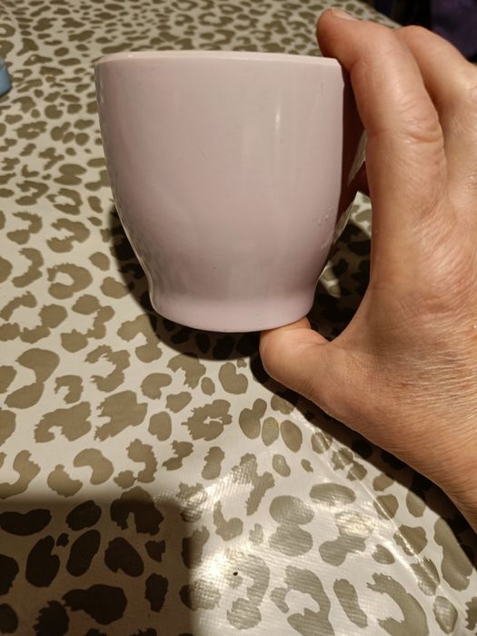 Mała osłonka na doniczkę różowa.