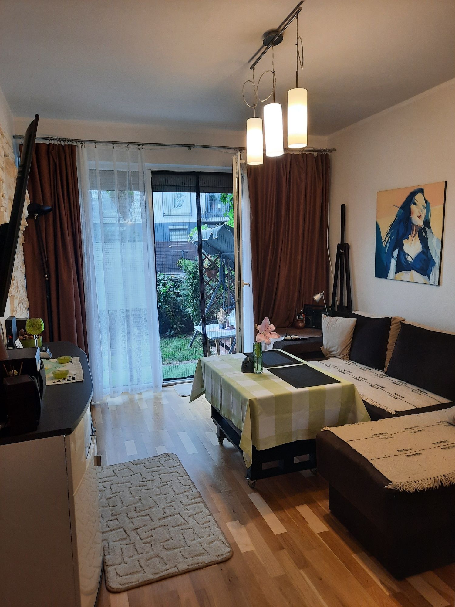 Apartament z ogródkiem w krainie jezior.