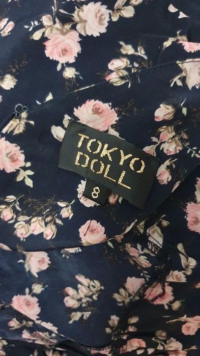 Krótki kombinezon w kwiaty