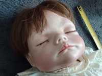 Porcelanowa lalka ok. 50 cm bo as b.ciezka realistyczne rysy