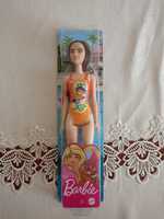 Nowa Barbie na plaży w kostiumie