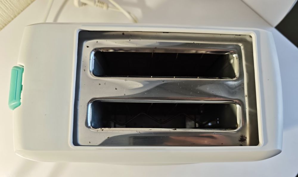 Продам тостер rising