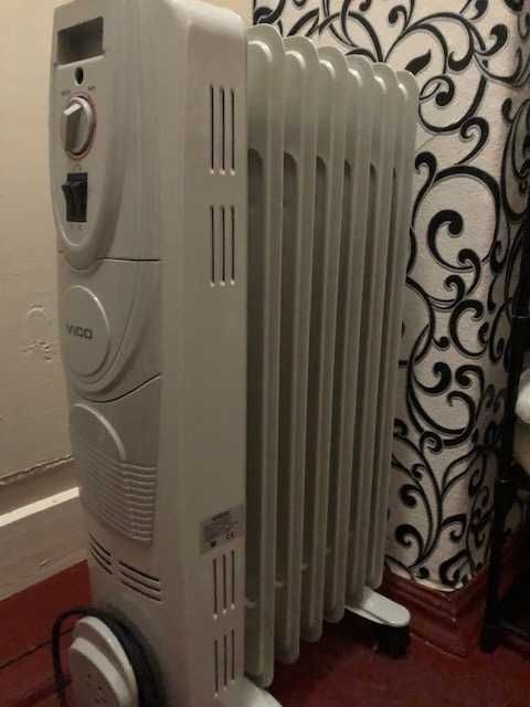 Продам обігрівачі масляні + керамічний