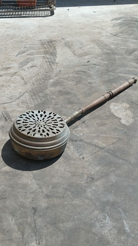 Aquecedor de cama antigo de cobre