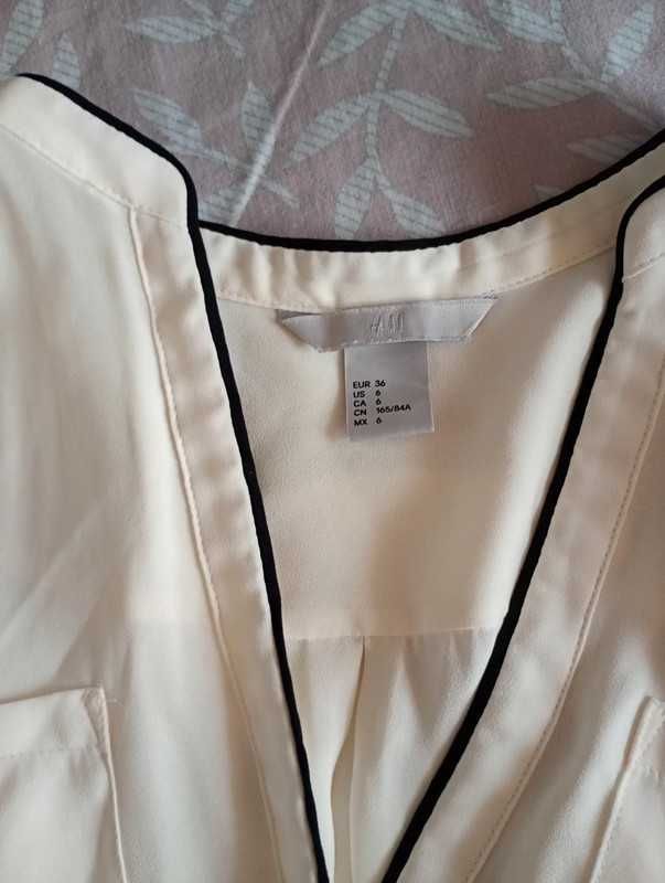 Sympatyczna beżowa bluza z 3/4 rękawem