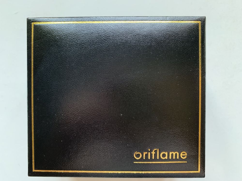 Годинник Oriflame