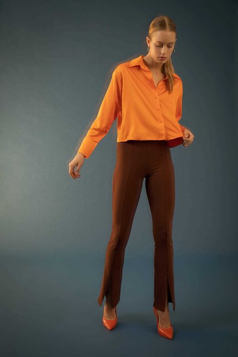 Брюки трендового крою з розрізами внизу