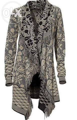 B. P. C. Bardzo kobiecy modny blezer