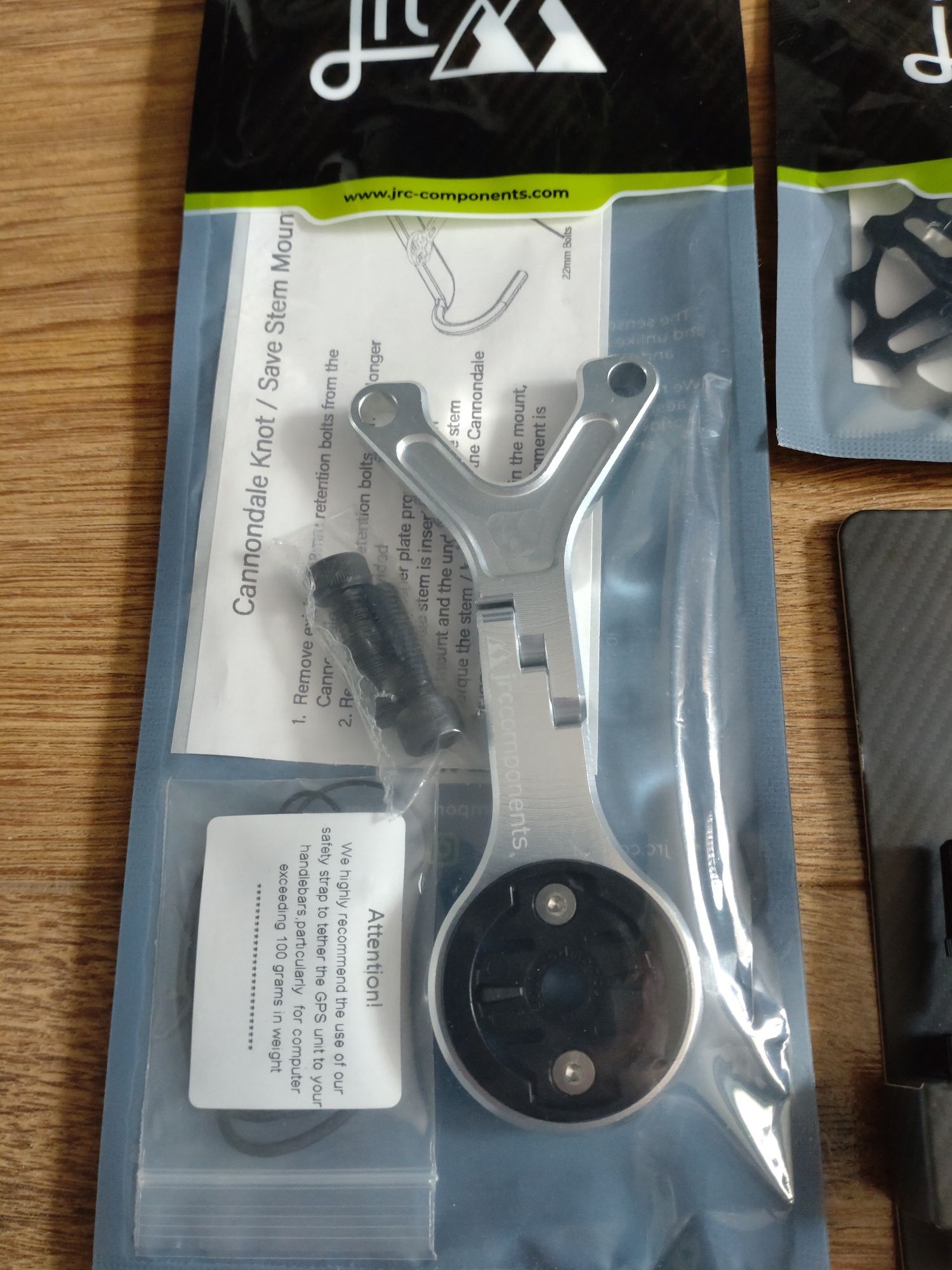 JRC Components uchwyt Garmin, zębatki, zaworki i zaślepki