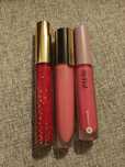 Trio błyszczyków. Paese, Loreal, Estee Lauder.